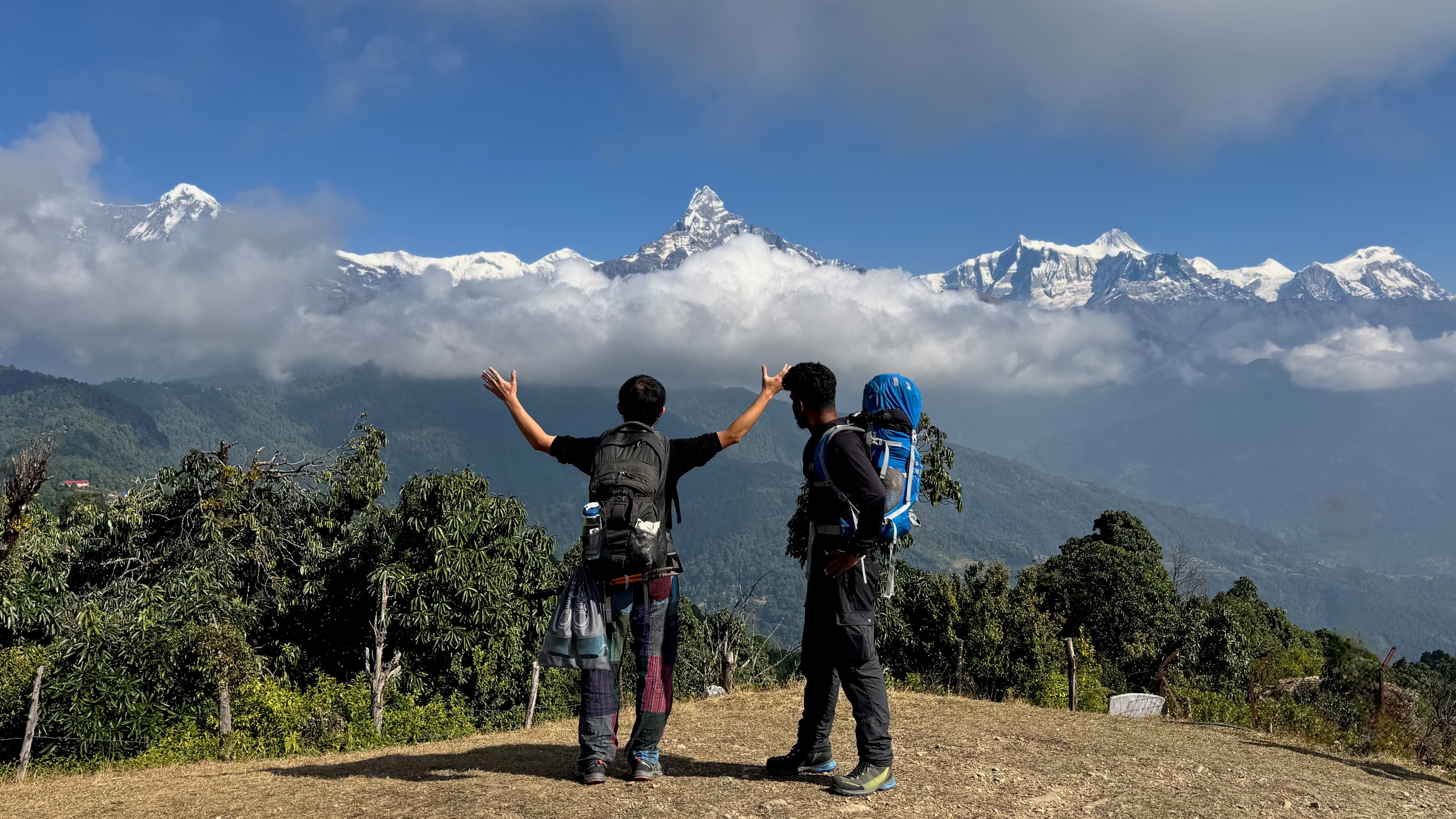 Trail-side route scene from the Nepal treks with mountains opening beyond